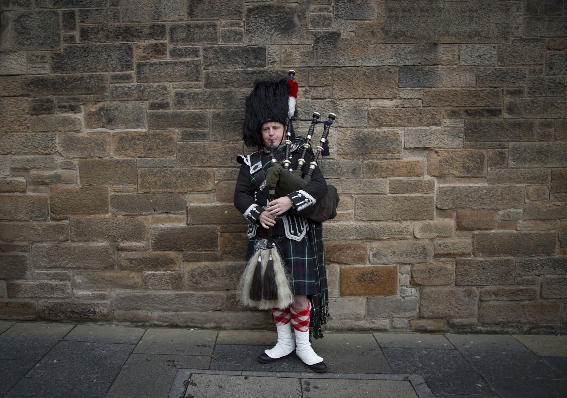 A visual face to a Scottish national identity; the kilt, bagpipers, the tartan weaves… 