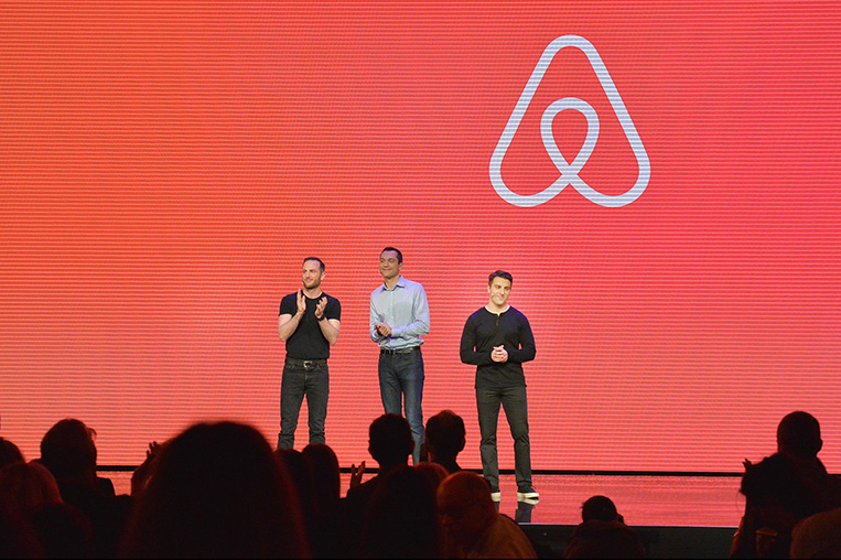 (L-R) Airbnb Founders CTO Nathan Blecharczyk, Chief Product Officer Joe Gebbia and CEO Brian Chesky speak onstage during the "Introducing Trips" Reveal at Airbnb Open LA on November 17, 2016 in Los Angeles, California. (Photo by Charley Gallay/Getty Images for Airbnb)